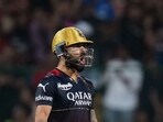 Royal Challengers Bangalore batter Virat Kohli celebrates after winning over Mumbai Indians during the IPL 2023 match 