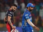 Virat Kohli (L) with Rohit Sharma Virat Kohli (L) with Rohit Sharma