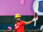 Punjab Kings batter Shikhar Dhawan celebrates after scoring a half-century during the IPL 2023 cricket match