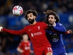 Soccer Football - Premier League - Chelsea v Liverpool - Stamford Bridge, London, Britain - April 4, 2023  Liverpool's Mohamed Salah in action with Chelsea's Marc Cucurella Action Images via Reuters/Andrew Couldridge EDITORIAL USE ONLY. No use with unauthorized audio, video, data, fixture lists, club/league logos or 'live' services. Online in-match use limited to 75 images, no video emulation. No use in betting, games or single club /league/player publications.  Please contact your account representative for further details.