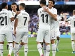 Real Madrid's Marco Asensio celebrates scoring their fifth goal with teammates 