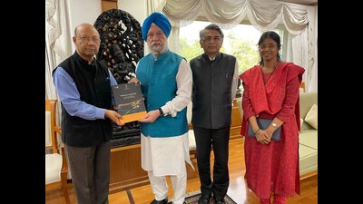 Keshav Verma, chairman of the committee, along with PSN Rao of School of Planning and Architecture (SPA) handed over the report to Hardeep Singh Puri on Tuesday (Twitter/HardeepSPuri)