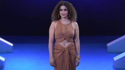 Actor Sanya Malhotra at the Citadel premiere. She wore a brown cutout dress for the event. Actor Sanya Malhotra at the Citadel premiere. She wore a brown cutout dress for the event.