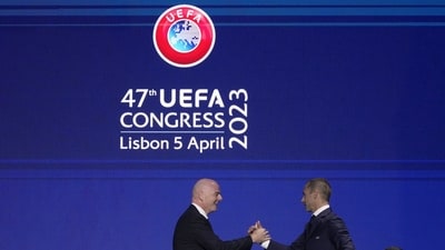 Gianni Infantino, left, president of FIFA, shakes hands with Aleksander Ceferin, president of UEFA, after delivering a speech at the start of the 47th ordinary UEFA congress in Lisbon (AP) Gianni Infantino, left, president of FIFA, shakes hands with Aleksander Ceferin, president of UEFA, after delivering a speech at the start of the 47th ordinary UEFA congress in Lisbon (AP)