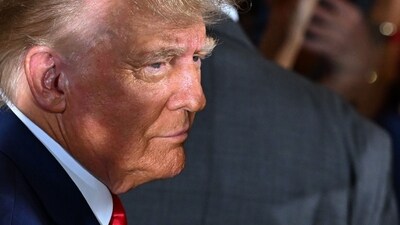 Former US president Donald Trump arrives to speak during a press conference. (AFP) Former US president Donald Trump arrives to speak during a press conference. (AFP)