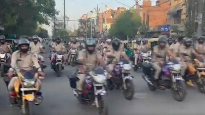 Delhi police conducting a flag march in Jahangirpuri on Wednesday ahead of Hanuman Jayanti. (ANI)