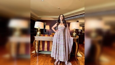 The set comes with an anarkali kurta, churidar pants and a sheer border embroidered dupatta. (Instagram/@mrunalthakur) The set comes with an anarkali kurta, churidar pants and a sheer border embroidered dupatta. (Instagram/@mrunalthakur)