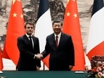 Chinese President Xi Jinping, right, shakes hands with France's President Emmanuel Macron at the end of a joint press conference at the Great Hall of the People in Beijing, China, Thursday. Chinese President Xi Jinping, right, shakes hands with France's President Emmanuel Macron at the end of a joint press conference at the Great Hall of the People in Beijing, China, Thursday.