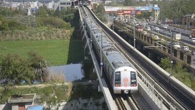 A Metro train on the tracks near Hindon River Metro Station in Ghaziabad Thursday. The two Metro extensions for which the development authority needs funds are from Vaishali to Mohan Nagar and Noida Sector 62 to Sahibabad. (Sakib Ali/HT Photo) A Metro train on the tracks near Hindon River Metro Station in Ghaziabad Thursday. The two Metro extensions for which the development authority needs funds are from Vaishali to Mohan Nagar and Noida Sector 62 to Sahibabad. (Sakib Ali/HT Photo)