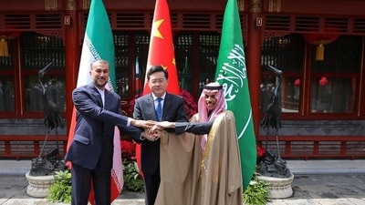 Iran's Foreign Minister Hossein Amirabdollahian, left, shakes hands with his Saudi Arabian counterpart Prince Faisal bin Farhan Al Saud, right, and Chineses counterpart Qin Gang in Beijing Thursday. (Iranian Foreign Ministry via AP/PTI) Iran's Foreign Minister Hossein Amirabdollahian, left, shakes hands with his Saudi Arabian counterpart Prince Faisal bin Farhan Al Saud, right, and Chineses counterpart Qin Gang in Beijing Thursday. (Iranian Foreign Ministry via AP/PTI)