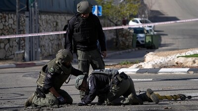 Israeli police remove the remains of an intercepted rocket fired from Lebanon in Shlomi, northern Israel Thursday, April 6, 2023. Israeli air defenses intercepted a rocket fired from Lebanon into northern Israel. (AP) Israeli police remove the remains of an intercepted rocket fired from Lebanon in Shlomi, northern Israel Thursday, April 6, 2023. Israeli air defenses intercepted a rocket fired from Lebanon into northern Israel. (AP)