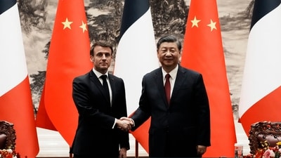 Chinese President Xi Jinping, right, shakes hands with France's President Emmanuel Macron at the end of a joint press conference at the Great Hall of the People in Beijing, China, Thursday. (AP) Chinese President Xi Jinping, right, shakes hands with France's President Emmanuel Macron at the end of a joint press conference at the Great Hall of the People in Beijing, China, Thursday. (AP)