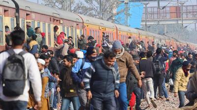 Commuters rush to catch an overcrowded train near a railway station in Ghaziabad, on the outskirts of New Delhi. (REUTERS File Photo/Representative)