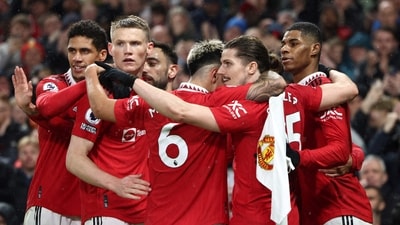 Manchester United's English striker Marcus Rashford (R) celebrates after scoring his team first goal during the English Premier League football match between Manchester United and Brentford at Old Trafford in Manchester, north west England, on April 5, 2023. (Photo by Darren Staples / AFP) / RESTRICTED TO EDITORIAL USE. No use with unauthorized audio, video, data, fixture lists, club/league logos or 'live' services. Online in-match use limited to 120 images. An additional 40 images may be used in extra time. No video emulation. Social media in-match use limited to 120 images. An additional 40 images may be used in extra time. No use in betting publications, games or single club/league/player publications. / (AFP) Manchester United's English striker Marcus Rashford (R) celebrates after scoring his team first goal during the English Premier League football match between Manchester United and Brentford at Old Trafford in Manchester, north west England, on April 5, 2023. (Photo by Darren Staples / AFP) / RESTRICTED TO EDITORIAL USE. No use with unauthorized audio, video, data, fixture lists, club/league logos or 'live' services. Online in-match use limited to 120 images. An additional 40 images may be used in extra time. No video emulation. Social media in-match use limited to 120 images. An additional 40 images may be used in extra time. No use in betting publications, games or single club/league/player publications. / (AFP)