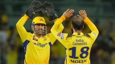 Chennai Super Kings bowler Moeen Ali celebrates with team captain MS Dhoni (PTI) Chennai Super Kings bowler Moeen Ali celebrates with team captain MS Dhoni (PTI)