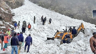 Rescue team members search for survivors after an avalanche in Sikkim on Tuesday. (REUTERS) Rescue team members search for survivors after an avalanche in Sikkim on Tuesday. (REUTERS)