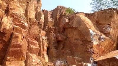 The Aravalli hillock in Bisar village from where illegal mining was reported. (HT Photo) The Aravalli hillock in Bisar village from where illegal mining was reported. (HT Photo)