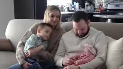 The Michigan based family with their newborn daughter. (News Centre Maine) The Michigan based family with their newborn daughter. (News Centre Maine)
