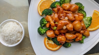 Coca-Cola and Chicken: A lot of people don't know this but 'Cola Chicken' is a dish that is very famous in Hong Kong. They prepare the chicken with cola and add other ingredients like sauce, barbecue sauce or ketchup. It can be made with both regular and diet cola.&nbsp; (Unsplash)