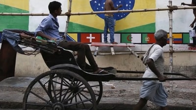 The image, taken from the video, shows a man pulling the rickshaw. (Twitter/@hvgoenka) The image, taken from the video, shows a man pulling the rickshaw. (Twitter/@hvgoenka)