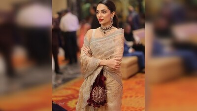Sobhita Dhulipala added some contrast to her look by pairing her contemporary saree with a maroon jewellery set. (Instagram/@sobhitad) Sobhita Dhulipala added some contrast to her look by pairing her contemporary saree with a maroon jewellery set. (Instagram/@sobhitad)