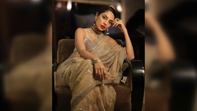 Sobhita Dhulipala tied her hair in a sleek mid-high ponytail and opted for subtle makeup with bold red lips. (Instagram/@sobhitad) Sobhita Dhulipala tied her hair in a sleek mid-high ponytail and opted for subtle makeup with bold red lips. (Instagram/@sobhitad)