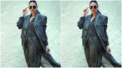 Neha wore her tresses into a clean ponytail with a middle part as she posed for the pictures.&nbsp; (Instagram/@nehadhupia)