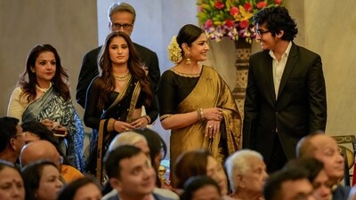 Raveena Tandon shares a laugh with son Ranbir Thadani as she attends the Padma Awards 2023 ceremony with family. (PTI) Raveena Tandon shares a laugh with son Ranbir Thadani as she attends the Padma Awards 2023 ceremony with family. (PTI)