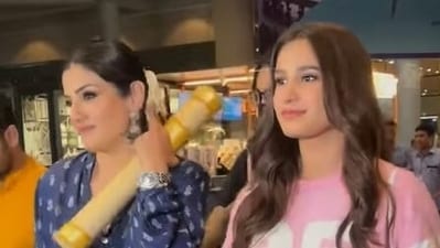 Raveena Tandon and Rasha at the Mumbai airport.