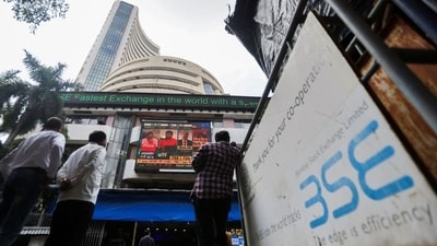 People stand outside the Bombay Stock Exchange (BSE). (REUTERS)