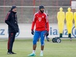 Newly-appointed Bayern Munich coach Thomas Tuchel (L) stands next to Bayern Munich's Cameroonian forward Eric Maxim Choupo-Moting as he oversees his first training session at German first division Bundesliga football club FC Bayern Munich on March 28, 2023 in Munich, southern Germany. - Tuchel, 49, has been appointed on a contract that runs until 2025 after Julian Nagelsmann was dismissed in just his second season in charge of Bayern. (Photo by Michaela Rehle / AFP) Newly-appointed Bayern Munich coach Thomas Tuchel (L) stands next to Bayern Munich's Cameroonian forward Eric Maxim Choupo-Moting as he oversees his first training session at German first division Bundesliga football club FC Bayern Munich on March 28, 2023 in Munich, southern Germany. - Tuchel, 49, has been appointed on a contract that runs until 2025 after Julian Nagelsmann was dismissed in just his second season in charge of Bayern. (Photo by Michaela Rehle / AFP)