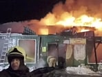 Firefighters battled a huge blaze in Mexico City’s sprawling wholesale market Thursday night without any reported injuries.