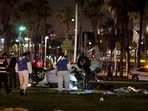 Israeli officials work at the scene of a shooting attack in Tel Aviv, Israel April 7, 2023.