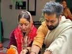 Actor Yami Gautam put up photos of herself praying alongside husband Aditya Dhar. Actor Yami Gautam put up photos of herself praying alongside husband Aditya Dhar.