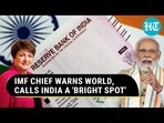 IMF CHIEF WARNS WORLD, CALLS INDIA A 'BRIGHT SPOT' 