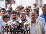 Senior Congress leader DK Shivakumar with party leaders Siddaramaiah and Randeep Surjewala addresses the media.(PTI)