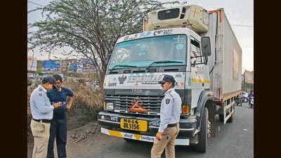 According to the traffic police department, heavy vehicles have been banned from central areas and major roads of the city and are allowed only on some roads, that too at night (RAVINDRA JOSHI/ HT PHOTO) According to the traffic police department, heavy vehicles have been banned from central areas and major roads of the city and are allowed only on some roads, that too at night (RAVINDRA JOSHI/ HT PHOTO)
