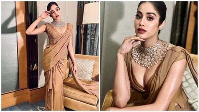 Janhvi Kapoor's style game has been right at the top ever since she entered the Bollywood industry. For a recent photoshoot, the actor donned a brown saree paired with a corset blouse and wooed her fans with her charm. (Instagram/@janhvikapoor) Janhvi Kapoor's style game has been right at the top ever since she entered the Bollywood industry. For a recent photoshoot, the actor donned a brown saree paired with a corset blouse and wooed her fans with her charm. (Instagram/@janhvikapoor)