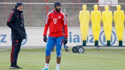 Newly-appointed Bayern Munich coach Thomas Tuchel (L) stands next to Bayern Munich's Cameroonian forward Eric Maxim Choupo-Moting as he oversees his first training session at German first division Bundesliga football club FC Bayern Munich on March 28, 2023 in Munich, southern Germany. - Tuchel, 49, has been appointed on a contract that runs until 2025 after Julian Nagelsmann was dismissed in just his second season in charge of Bayern. (Photo by Michaela Rehle / AFP) (AFP) Newly-appointed Bayern Munich coach Thomas Tuchel (L) stands next to Bayern Munich's Cameroonian forward Eric Maxim Choupo-Moting as he oversees his first training session at German first division Bundesliga football club FC Bayern Munich on March 28, 2023 in Munich, southern Germany. - Tuchel, 49, has been appointed on a contract that runs until 2025 after Julian Nagelsmann was dismissed in just his second season in charge of Bayern. (Photo by Michaela Rehle / AFP) (AFP)