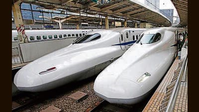 FILE - In this Sept. 24, 2014 filephoto, passengers get on the Shinkansen high-speed train at Tokyo station in Tokyo. Indian Prime Minister Narendra Modi hopes the visit this weekend by Shinzo Abe, starting Friday, Dec. 11, 2015, will be a major step in transforming India into an economic powerhouse with Japan's help in building bullet trains, "smart cities" and accessing nuclear technology. India and Japan are set to sign a $15 billion agreement for a high-speed train linking the Indian financial hub of Mumbai with Ahmadabad, the commercial capital of Modi's home state, Gujarat. The train would cut travel time on the 505 kilometer (315 mile) route from eight hours to two. (AP Photo/Shizuo Kambayashi, File) (AP) FILE - In this Sept. 24, 2014 filephoto, passengers get on the Shinkansen high-speed train at Tokyo station in Tokyo. Indian Prime Minister Narendra Modi hopes the visit this weekend by Shinzo Abe, starting Friday, Dec. 11, 2015, will be a major step in transforming India into an economic powerhouse with Japan's help in building bullet trains, "smart cities" and accessing nuclear technology. India and Japan are set to sign a $15 billion agreement for a high-speed train linking the Indian financial hub of Mumbai with Ahmadabad, the commercial capital of Modi's home state, Gujarat. The train would cut travel time on the 505 kilometer (315 mile) route from eight hours to two. (AP Photo/Shizuo Kambayashi, File) (AP)
