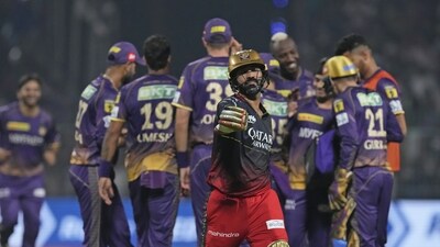 Royal Challengers Bangalore's Dinesh Karthik leaves the field after being dismissed during the Indian Premier League (IPL) cricket match between Royal Challengers Bangalore and Kolkata Knight Riders in Kolkata, India, Thursday, April 6, 2023. (AP Photo/Bikas Das) (AP) Royal Challengers Bangalore's Dinesh Karthik leaves the field after being dismissed during the Indian Premier League (IPL) cricket match between Royal Challengers Bangalore and Kolkata Knight Riders in Kolkata, India, Thursday, April 6, 2023. (AP Photo/Bikas Das) (AP)