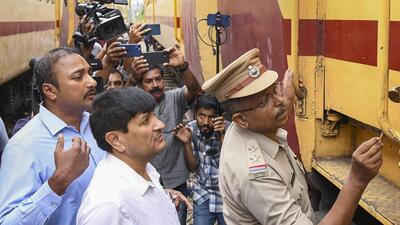 NIA officials inspect the Alappuzha-Kannur Executive Express train after fire incident (PTI Photo) NIA officials inspect the Alappuzha-Kannur Executive Express train after fire incident (PTI Photo)