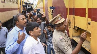 National Investigation Agency officials inspect the Alappuzha-Kannur Executive Express train, in Kozhikode district. (PTI) National Investigation Agency officials inspect the Alappuzha-Kannur Executive Express train, in Kozhikode district. (PTI)