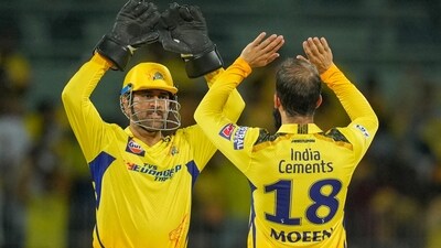 MS Dhoni with Moeen Ali. (PTI) MS Dhoni with Moeen Ali. (PTI)