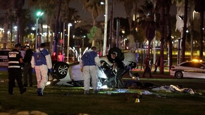 Israeli officials work at the scene of a shooting attack in Tel Aviv, Israel April 7, 2023. (REUTERS)