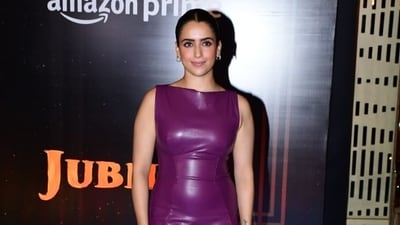 Sanya Malhotra was spotted in a latext purple dress at the screening of Jubilee. The show takes the viewers to the initial years of cinema in India. (Varinder Chawla) Sanya Malhotra was spotted in a latext purple dress at the screening of Jubilee. The show takes the viewers to the initial years of cinema in India. (Varinder Chawla)