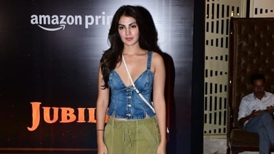 Rhea Chakraborty also made an appearance at the Jubilee screening. She was spotted in a denim top and olive green pants. (Varinder Chawla) Rhea Chakraborty also made an appearance at the Jubilee screening. She was spotted in a denim top and olive green pants. (Varinder Chawla)
