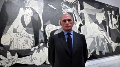 Bernard Ruiz-Picasso, grandson of Pablo Picasso, poses in front of the Spanish painter's masterpiece 'Guernica' (THOMAS COEX/AFP) Bernard Ruiz-Picasso, grandson of Pablo Picasso, poses in front of the Spanish painter's masterpiece 'Guernica' (THOMAS COEX/AFP)
