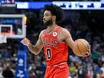 Apr 7, 2023; Dallas, Texas, USA; Chicago Bulls guard Coby White (0) brings the ball up court against the Dallas Mavericks during the first half at the American Airlines Center. Mandatory Credit: Jerome Miron-USA TODAY Sports