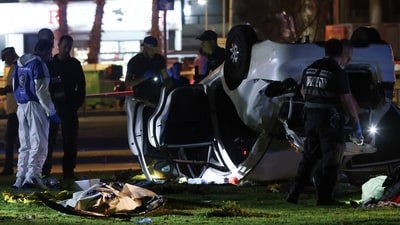 Tel Aviv: Israeli police and emergency service stand around a car involved in an attack in Tel Aviv, Israel, Friday, April 7, 2023. (AP) Tel Aviv: Israeli police and emergency service stand around a car involved in an attack in Tel Aviv, Israel, Friday, April 7, 2023. (AP)
